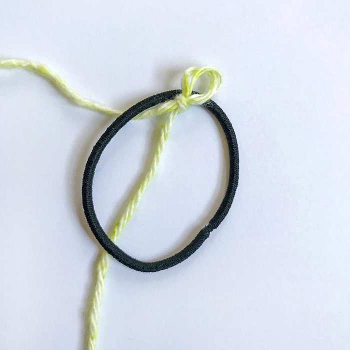 step 1 in crocheting around a ring