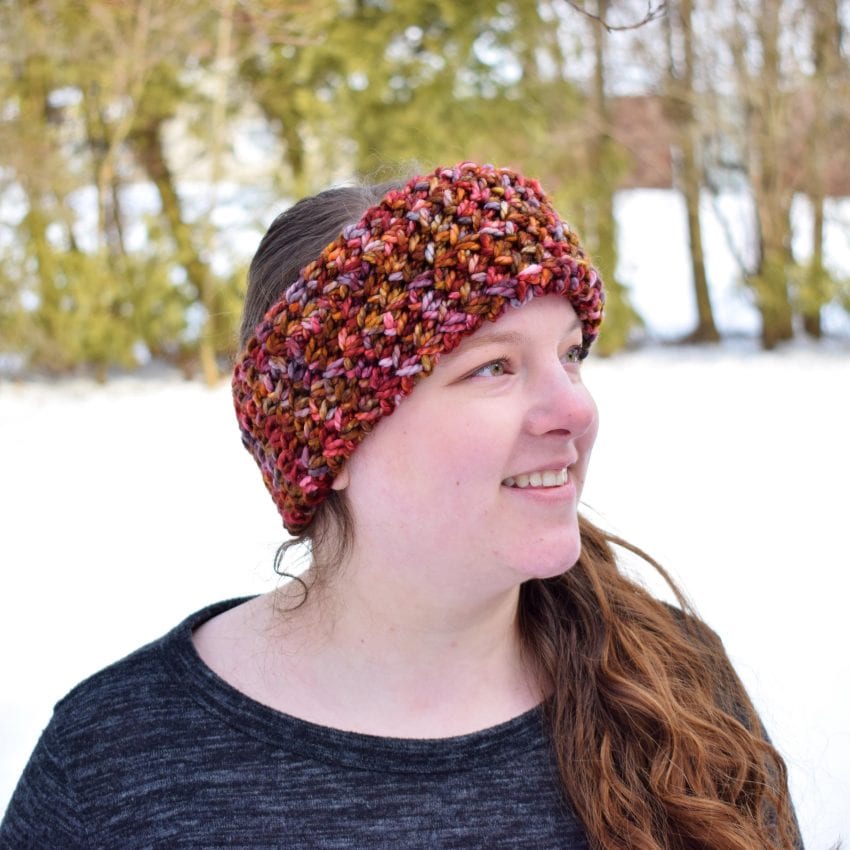 red brown crochet earwarmer on a head