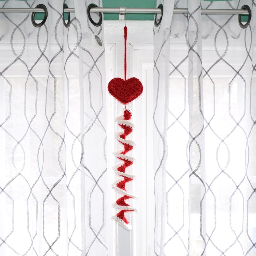 red hanging crochet heart wind spinner