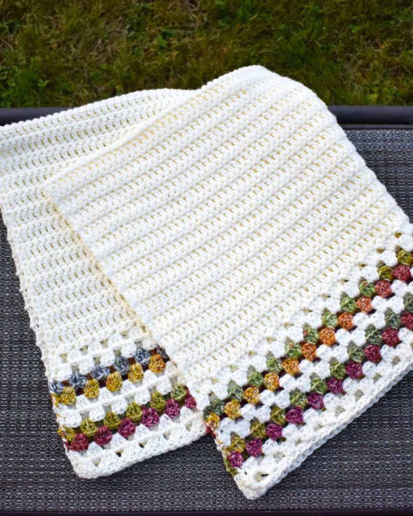 off white crochet blanket with granny stripe edges